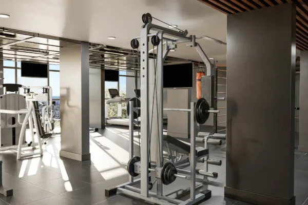 El gimnasio tiene vistas hacia la plaza seca y la piscina El gimnasio tiene vistas hacia la plaza seca y la piscina