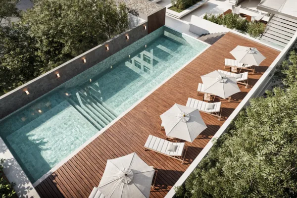 Piscina en continuación con la Plaza Seca y con un extenso Solarium Piscina en continuación con la Plaza Seca y con un extenso Solarium